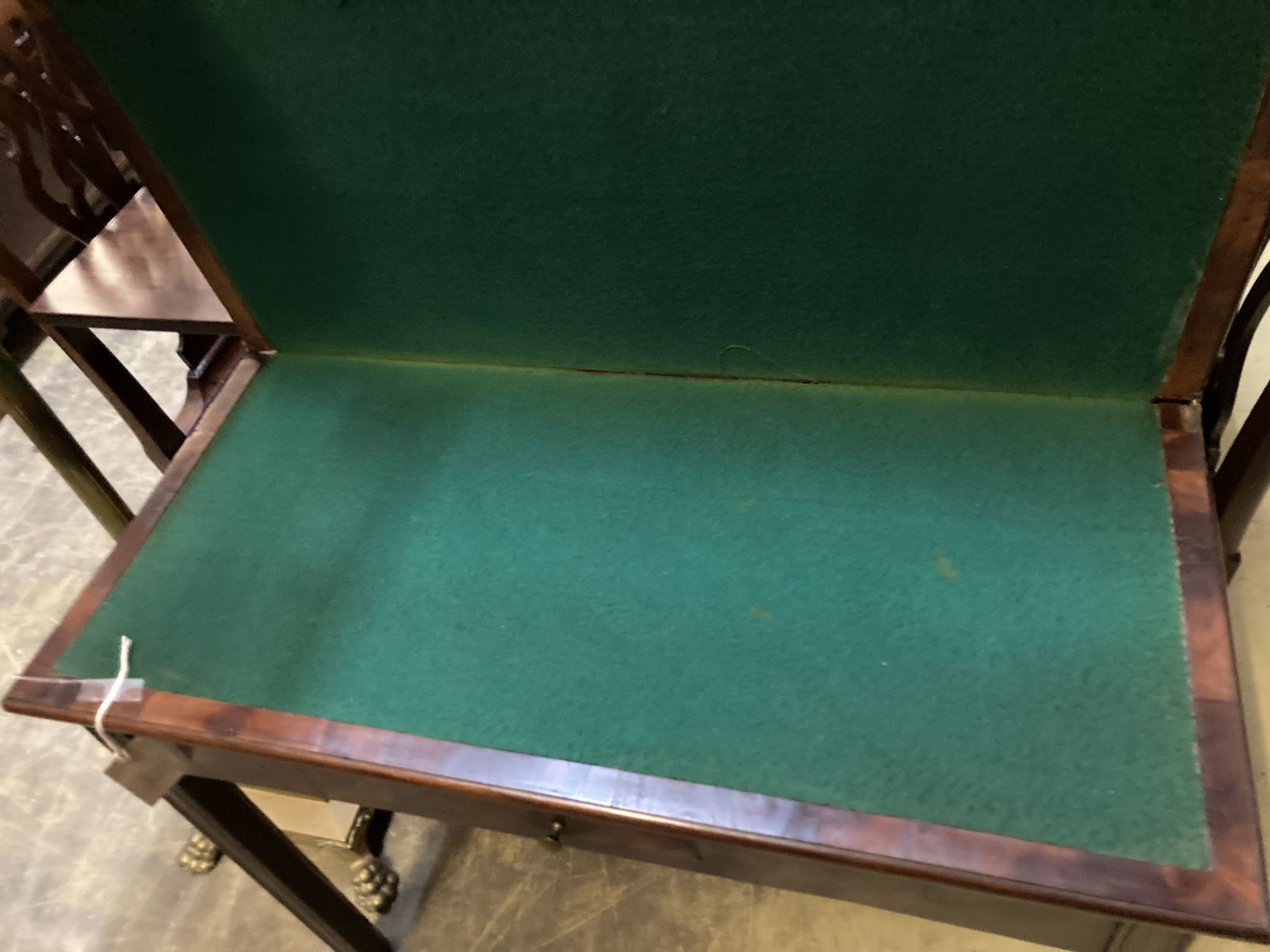 A George III rectangular inlaid mahogany folding card table, width 88cm, depth 41cm, height 73cm